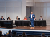 Lion's Den DFW Speaker on Stage