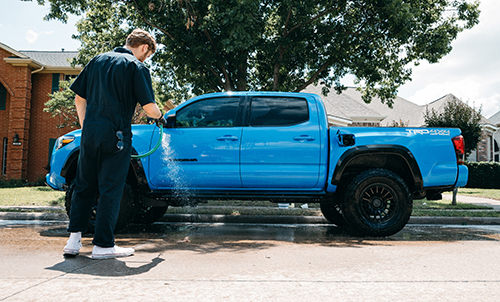 side view of Tacoma Toyota truck being washed in Dallas, Texas